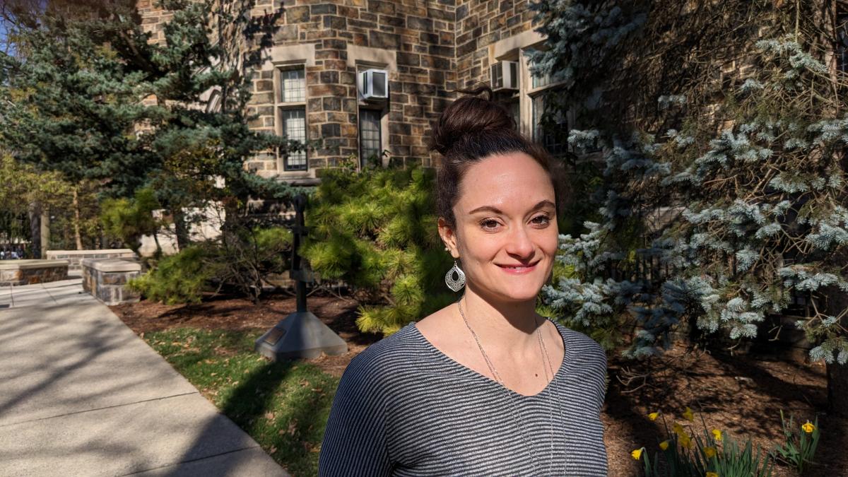 Jenna Rose smiles as she stands outside Packard Lab on the campus of Lehigh University on a sunny spring morning.
