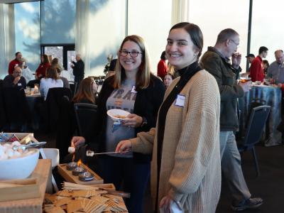 Lehigh employees enjoy making Smores at the Winter Festival in December