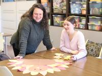 Carolina Hernandez of the Community Service Office works with a Lehigh student