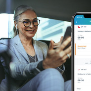A traveler checks her itinerary on the CTP Mobile app