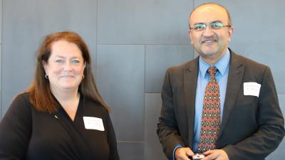 Mary Jo McNulty inducts Mayuresh Kothare into the 25 Year Club