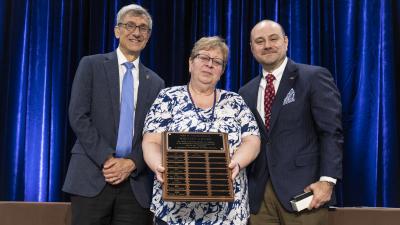 Nancy Bauder receives the John W. and Barbara R. Woltjen Award