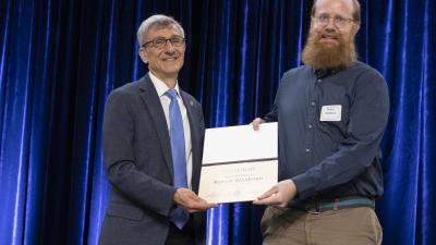 Robert Weidman receives the Hillman Exempt Staff Award